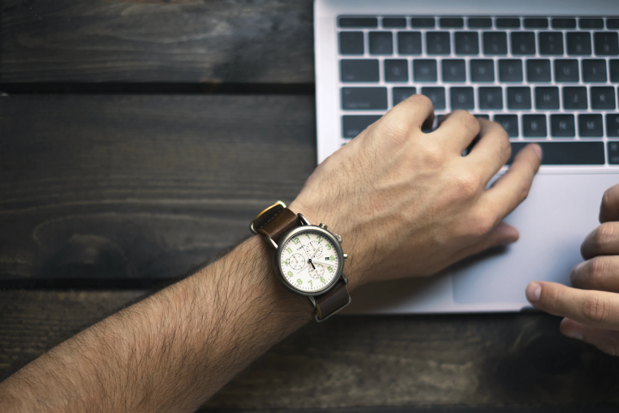 man-in-a-watch-typing