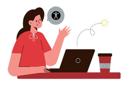 a white woman in a red shirt with brown hair sits at a computer and considers features that are accessible.