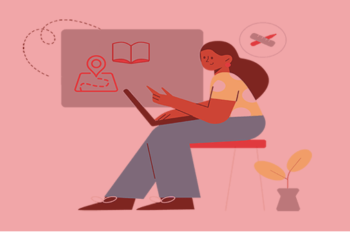 Brown female leans over her computer and considers her course design