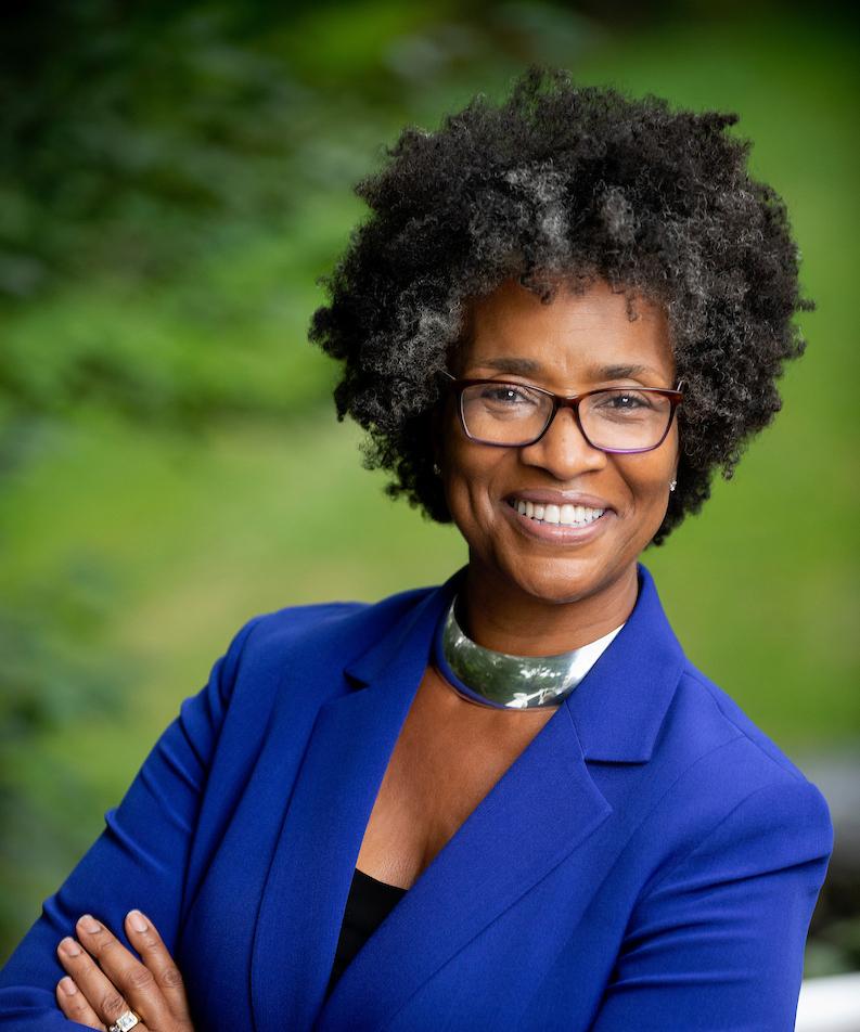 Headshot of Sharon L. Fries-Britt, Ph.D., a Black woman wearing a blue suit jacket and glasses